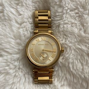 Michael Kors gold watch.